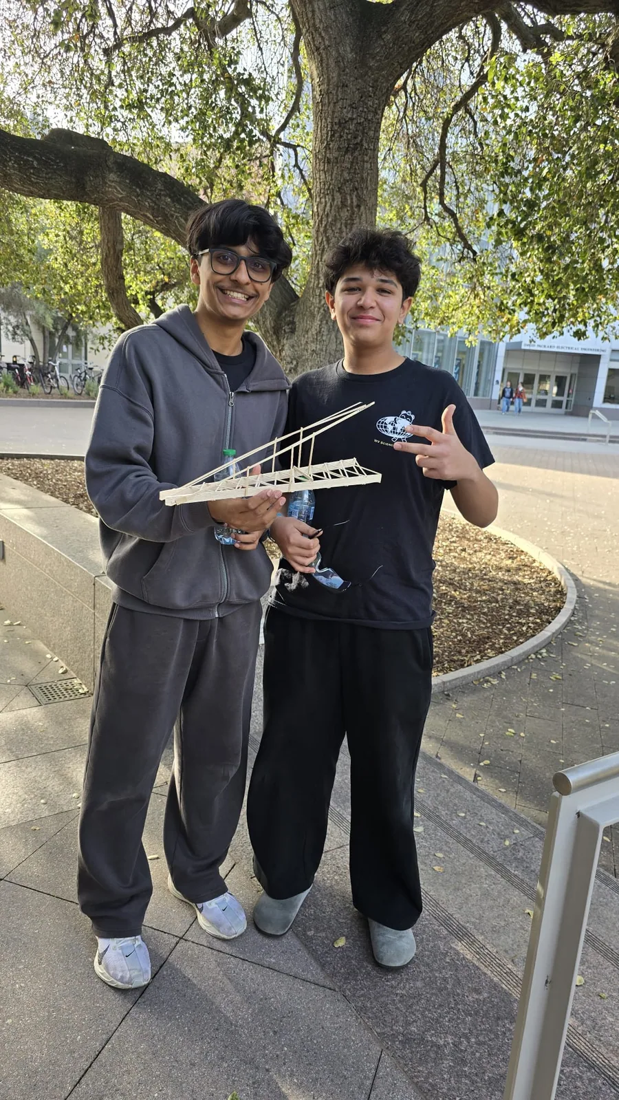 Westview students holding their completed boomilever structure
